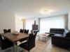 1 Wohnzimmer - Zeitlos und komfortabel! 3-Zimmer-Wohnung in moderner Mehrfamilien-Stadtvilla