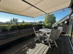 13 - Exklusives Penthouse-Unikat in erster Rheinlage über drei Ebenen mit einer Einbauküche und Dachterrasse